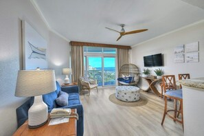 The ocean view living room is fabulous for movie night with the family.