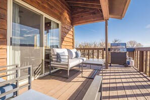 The spacious backyard offers plenty of room for kids and pets, plus a perfect setting for BBQs and outdoor dining.