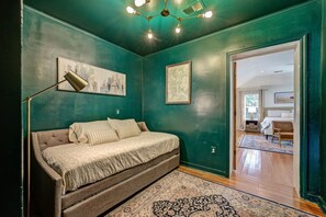 The Green Room - two twin mattresses in the pullout daybed. Please note, guests must move through this room to get to the master  suite, which has an attached bathroom.