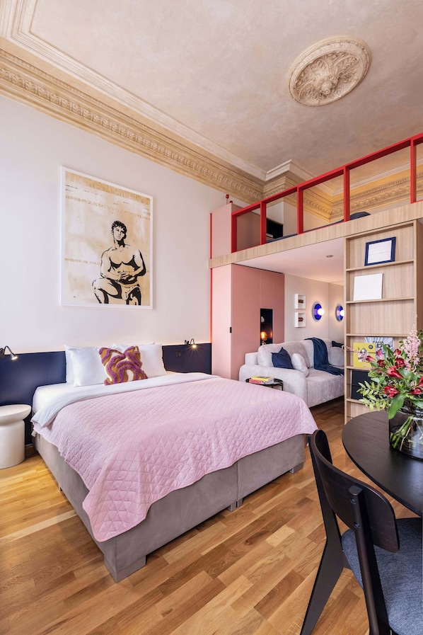 Gorgeous spacious two level apartment with two opened bedrooms and possibility to accommodate up to 8 people. In the lower floor there is queen size bed and convertible sofa which can be prepared as extra bed