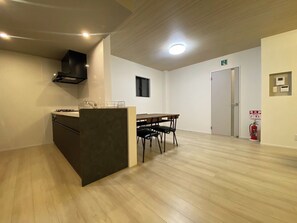 A 20-tatami living room with a dining table.