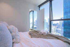 Bedroom with panoramic city views