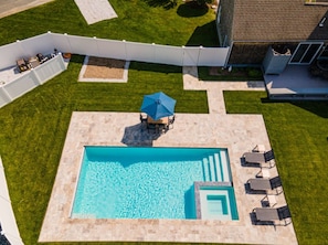 Drone view of new saltwater heated pool and hot tub