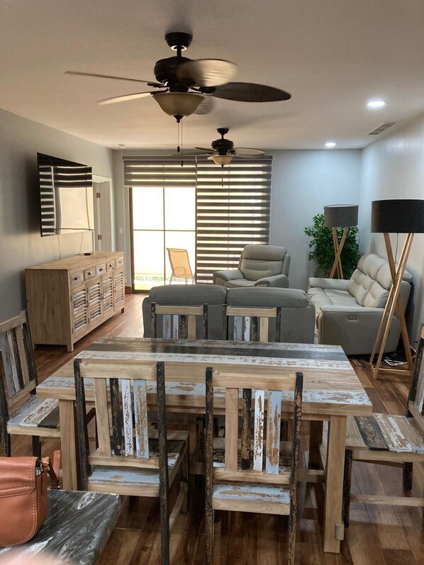 Open concept living and dining room with modern furnishings