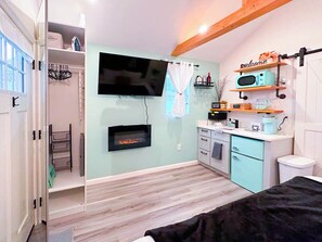 Enjoy fireplace ambiance and smart TV