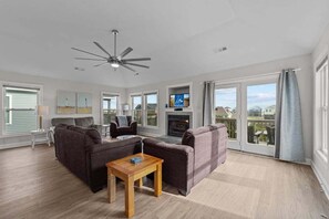 Top-Level Living Room with Deck Access