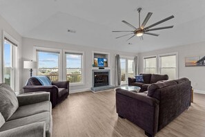 Top-Level Living Room with Deck Access