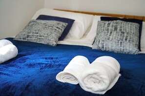 iron, ironing board, chest drawer