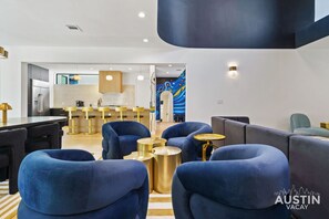 Step into elegance and comfort in this dedicated seating are that features bold and modern décor