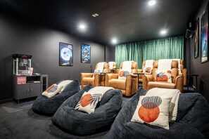 🎥 Movie nights made perfect! Enjoy your favorite films in our theater room, complete with reclining leather chairs, a popcorn machine, and an 85-inch TV for the ultimate cinematic experience.