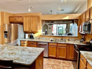 Large renovated kitchen with island.