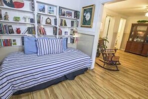 this bed is not in a private room is it in a nook off the living and dining for additional sleeping 
