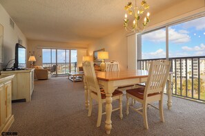 This corner condo features lots of glass sliders so you can enjoy views of the Gulf and island