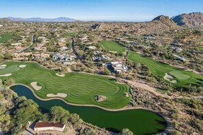 Stunning views of lush green fairways and desert landscapes