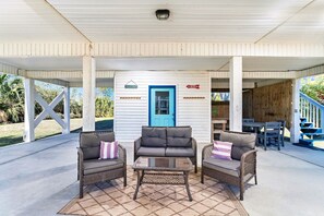 Great outdoor living with al fresco dining options, fish cleaning station, and outdoor shower