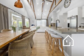 Indoor dining for 6-8, with breakfast bar for 4