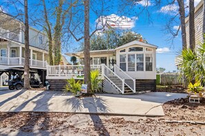 Front of house with golf cart