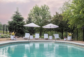 Relax in the pool side lounge chairs and take in the expanse of the outdoors.
