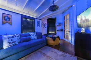 Immerse yourself in the magic of the Harry Potter Games Room, complete with floating candles, themed decor, and soft lighting for an enchanting ambiance.