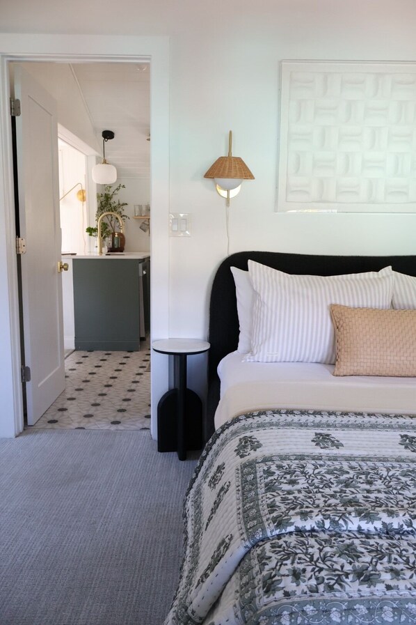 Bedroom adjacent to kitchen with great lighting!