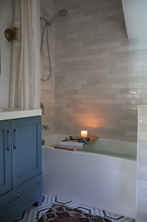 Renovated bath with deep soaking tub