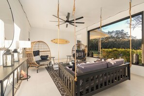 Guest-favorite swing bed—perfect for relaxing and enjoying the fresh air.