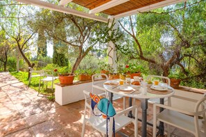 External patio with surrounding nature from the property grounds