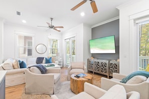 Living features a smart tv and two walkouts to your private patio.
