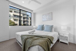 Brand-new king bed with a plush, comfortable mattress to ensure a restful night’s sleep.