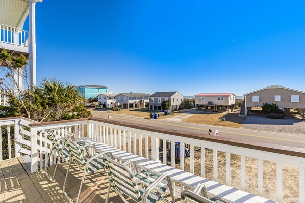 Plenty of comfortable seating! Relax on the deck with beach view.