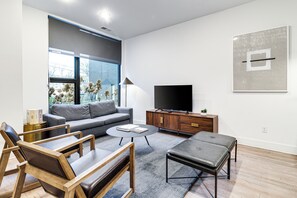 Living, dining & kitchen spaces blend seamlessly in this open-concept area. 