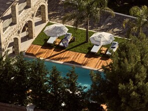 Witness the captivating landscape surrounding the villa. 