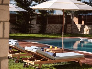 Tranquil lounging spot with sunny views and refreshing ambiance.