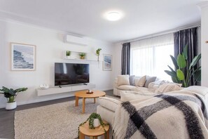 Living area with large smart TV