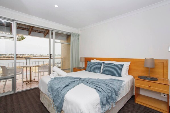 Main Bedroom with balcony overlooking the water