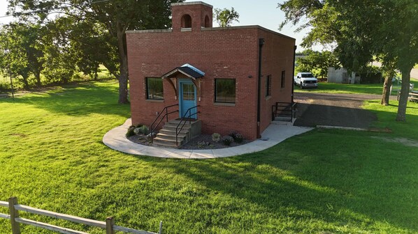 1920- K-8th Schoolhouse  1940(ish)- Dairy Farm 1960(ish)-Personal Home 2025- Vacation Home