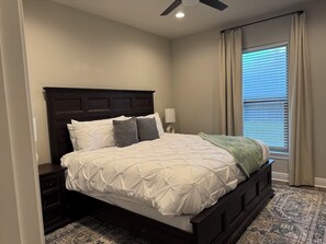 Soft lighting, plush bedding, and plenty of space—this king bedroom is your retreat for restful nights. Stay tuned for professional photos!