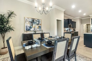 Discover the stunning dining area of this pet-friendly and best Airbnb in Lake Charles. Enjoy modern amenities, stylish decor, and a welcoming atmosphere for a memorable stay.