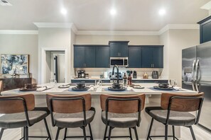 Enjoy the heart of Lakes Landing, the best Airbnb in Lake Charles! This pet-friendly home features a modern kitchen with a spacious island, perfect for gathering, cooking, and making memories during your stay.