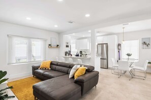 Relax in the cozy, light-filled living area