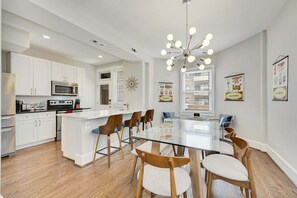 Dining room and kitchen with full breakfast bar