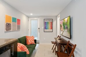 55" Roku Smart TV and twin convertible futon sofa