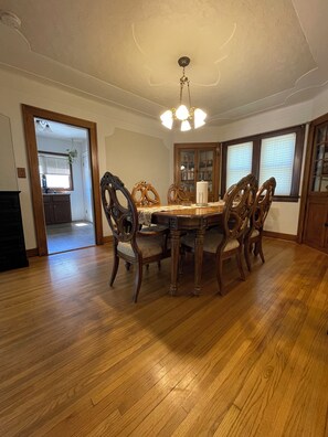 Comfortable seating for 6 in the dining area. Armrests on 2 of the chairs.