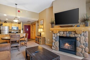 Indoors, Fireplace, Screen, Furniture, Living Room