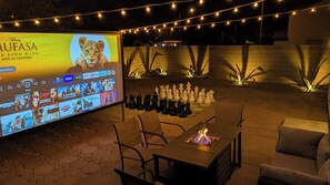 Back yard with Theater Screen and Giant Chess