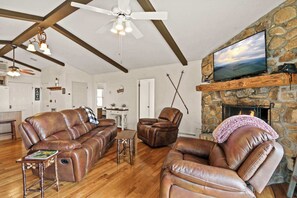 A comfortable couch graces the living area, inviting you to relax and unwind in style