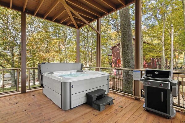 Make a splash in our house's hot tub – the ideal spot to unwind and enjoy the serenity of your surroundings. Experience the epitome of comfort and leisure.