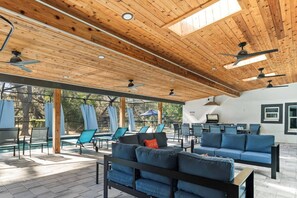 Enormous space with wood plank ceiling and sky lights to get everyone close!