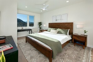 Master bedroom with king sized bed and private, en suite master bathroom.