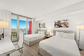 Your waterfront retreat awaits! Our balcony provides front-row seats to boat activity, friendly manatees, and colorful fish, all beneath the sunset's warm glow. Sleep soundly on two full-sized beds.